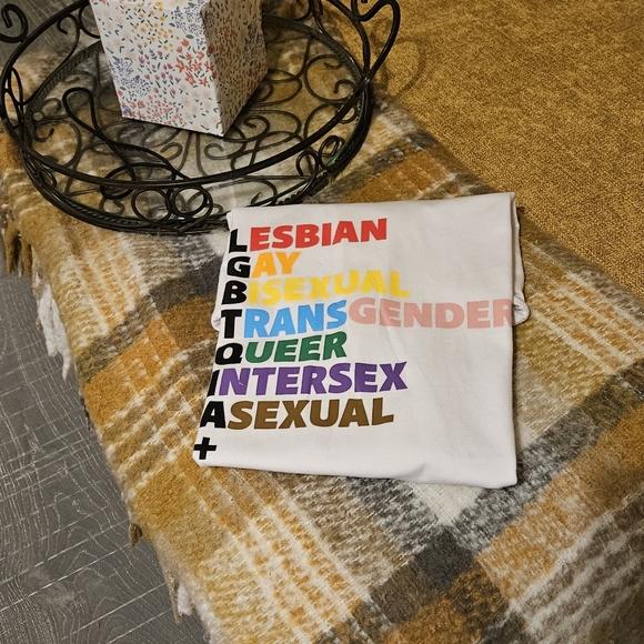 Size medium colorful tee-shirt and cup/soda holder. - Picture 3 of 4